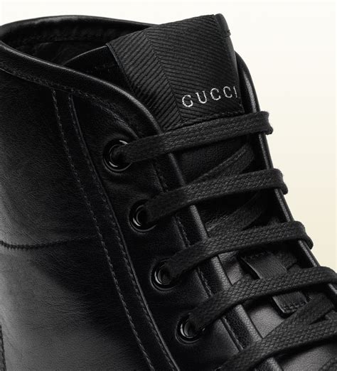 gucci black and tan high tops|all black Gucci high tops.